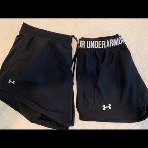 2 pair women’s Under Armour shorts size large